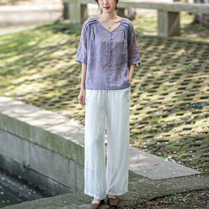 Áo sơ mi linen ngắn tay cổ V thêu hoa lá vai xếp ly - NU10140