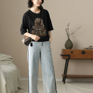 Áo T-shirt ngắn tay cổ tròn in cô gái quay lưng - NU10206