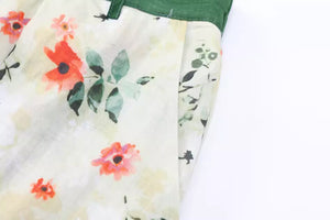 Chân váy linen retro lưng cao in hoa lá hai túi chéo - NU9047