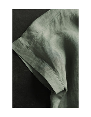 Đầm liền linen ngắn tay cổ tròn khuy cài sau hai túi vuông - D006