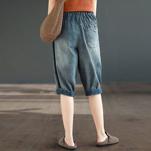 Quần baggy lửng denim lưng thun thêu hoa lá đối xứng - NU8884