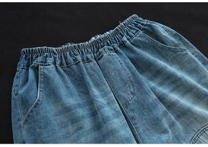 Quần baggy lửng denim lưng thun thêu hoa lá đối xứng - NU8884