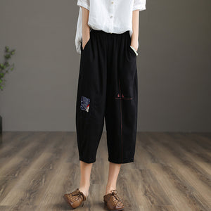 Quần baggy linen lưng thun thêu hoa văn hai túi chéo - NU6877