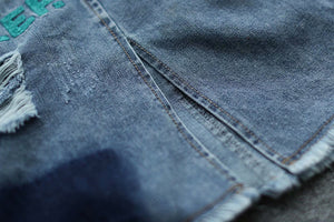Chân váy denim lưng thun thêu cô bé xẻ tà - NU8658
