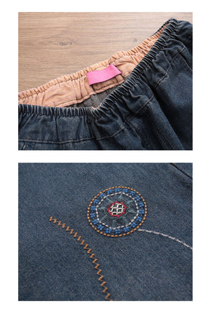 Quần baggy denim lưng thun thêu vòng tròn trừu tượng - NU7787