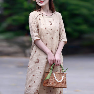 Đầm liền linen ngắn tay cổ tròn thêu hoa lá đơn sắc - NU8440