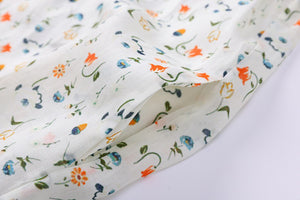 Đầm liền linen tay lửng cổ đứng phối vạt màu in hoa lá - NU8374