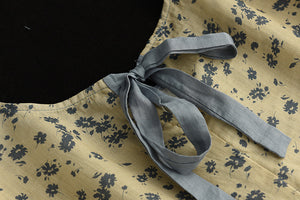 Áo T-shirt linen ngắn tay cổ tròn thắt nơ sau in hoa lá - NU7406