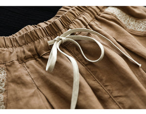 Quần baggy linen lưng thun dây rút hai túi viền thêu hoa văn - NU7167