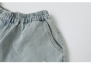 Quần sooc denim lưng thun một túi vuông kiểu sờn - NU7109