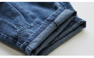 Quần baggy yếm denim một túi nhỏ - NU6934