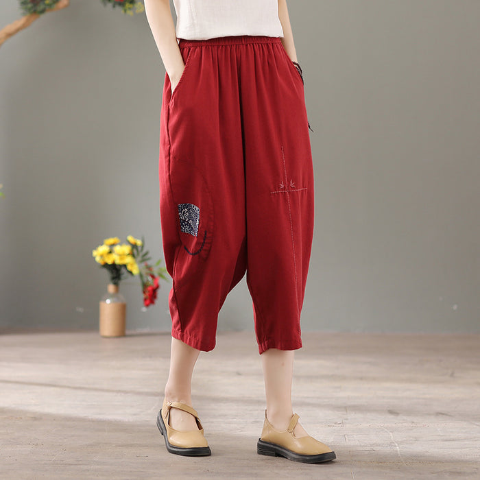 Quần baggy linen lưng thun thêu hoa văn hai túi chéo - NU6877