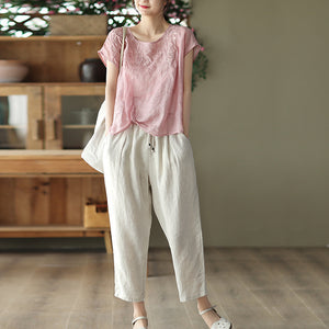 Áo T-shirt linen sát nách cổ tròn thêu hoa văn kiểu lệch tà - NU7297