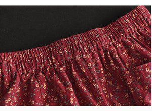 Chân váy linen lưng thun thắt dây xẻ tà chéo in hoa liti - NU8317