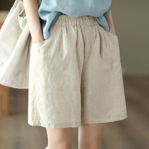 Quần sooc linen lưng thun hai túi chéo một màu - NU7039
