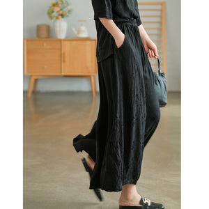 Quần baggy lưng thun ống rộng thêu hoa văn nổi - NU7542