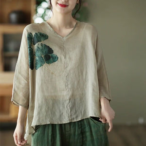 Áo T-shirt linen ngắn tay cổ V lệch tà in cỏ ba lá - NU7368