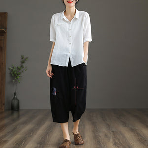 Quần baggy linen lưng thun thêu hoa văn hai túi chéo - NU6877