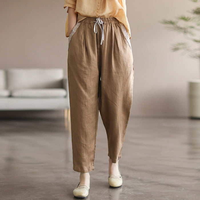 Quần baggy linen lưng thun dây rút hai túi viền thêu hoa văn - NU7167
