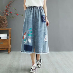 Chân váy denim lưng thun thêu cô bé xẻ tà - NU8658