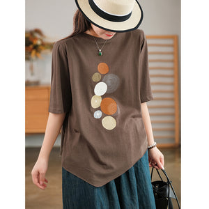 Áo T-shirt ngắn tay cổ tròn vạt chéo in những vòng tròn - NU7243