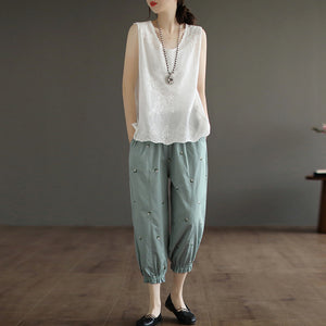 Áo T-shirt sát nách cổ tròn thêu hoa văn vòng xoáy - NU7448