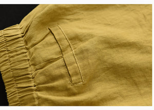 Quần sooc linen lưng thun hai túi chéo một màu - NU7039