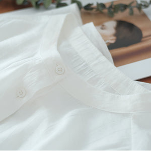 Áo sơ mi linen ngắn tay cổ tròn xếp ly tà lệch bo tròn - NU7388