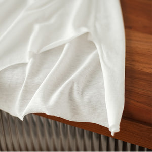 Áo T-shirt ngắn tay cổ tròn vạt chéo in những vòng tròn - NU7243