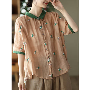 Áo sơ mi linen ngắn tay cổ pipi lệch màu thêu bông hoa cô đơn - NU7399