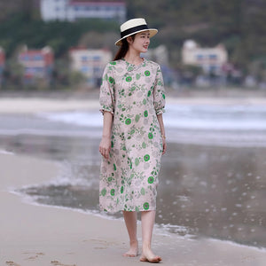 Đầm liền linen ngắn tay cổ tròn kiểu vạt lệch in hoa lá xanh - NU8584