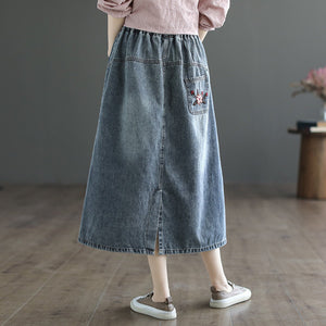 Chân váy denim lưng thun thêu những bông hoa một túi sau - NU8292