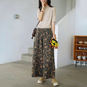 Quần baggy lưng thun ống rộng hai túi chéo in hoa lá - NU7044