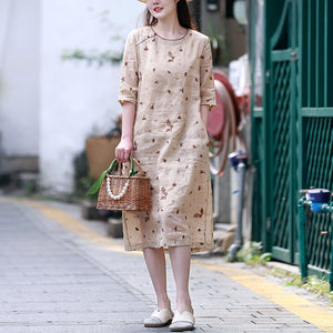 Đầm liền linen ngắn tay cổ tròn thêu hoa lá đơn sắc - NU8440