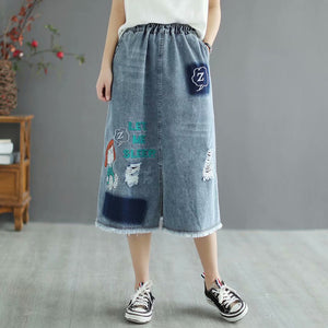 Chân váy denim lưng thun thêu cô bé xẻ tà - NU8658