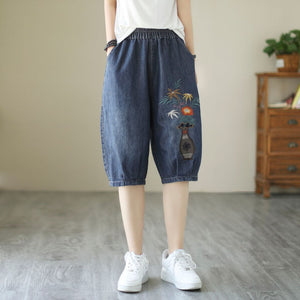 Quần baggy lửng denim lưng thun thêu bình cắm hoa - NU8563