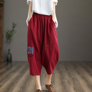 Quần baggy linen lưng thun thêu hoa văn hai túi chéo - NU6877
