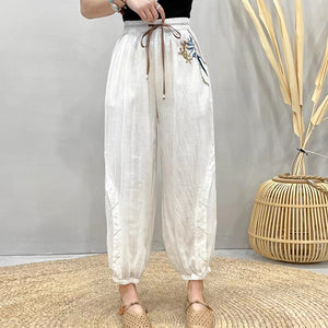 Quần baggy linen lưng thun thêu hoa hoa lá ống túm - NU8455