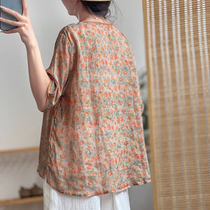 Áo sơ mi linen ngắn tay cổ trái tim vạt chéo in hoa lá - NU7467
