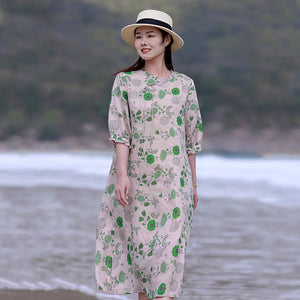 Đầm liền linen ngắn tay cổ tròn kiểu vạt lệch in hoa lá xanh - NU8584