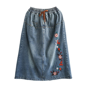 Chân váy denim lưng thun thêu những bông hoa một túi sau - NU8292