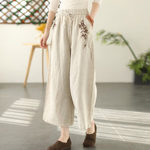 Quần baggy linen lưng thun dây rút ống rộng thêu hoa lá - NU8294