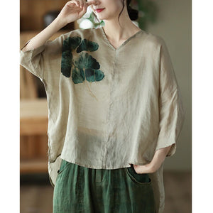 Áo T-shirt linen ngắn tay cổ V lệch tà in cỏ ba lá - NU7368