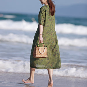 Đầm liền linen in hoa lá ngắn tay cổ tròn eo thắt dây - NU8579