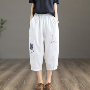 Quần baggy linen lưng thun thêu hoa văn hai túi chéo - NU6877