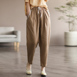 Quần baggy linen lưng thun dây rút hai túi viền thêu hoa văn - NU7167