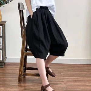 Quần baggy lửng linen lưng thun một màu hai túi chéo  - NU7076