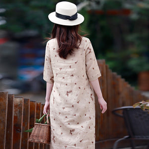 Đầm liền linen ngắn tay cổ tròn thêu hoa lá đơn sắc - NU8440