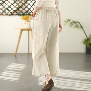 Quần baggy linen lưng thun dây rút ống rộng thêu hoa lá - NU8294