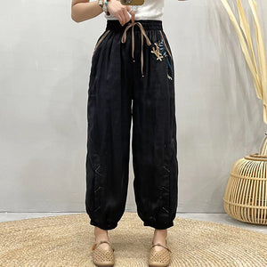 Quần baggy linen lưng thun thêu hoa hoa lá ống túm - NU8455